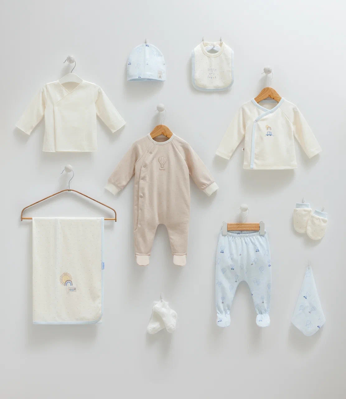 Baby 100% cotton hospital set including an overall, shirt, pants, bib, hat, mittens, socks and a blanket in Beirut, Lebanon.