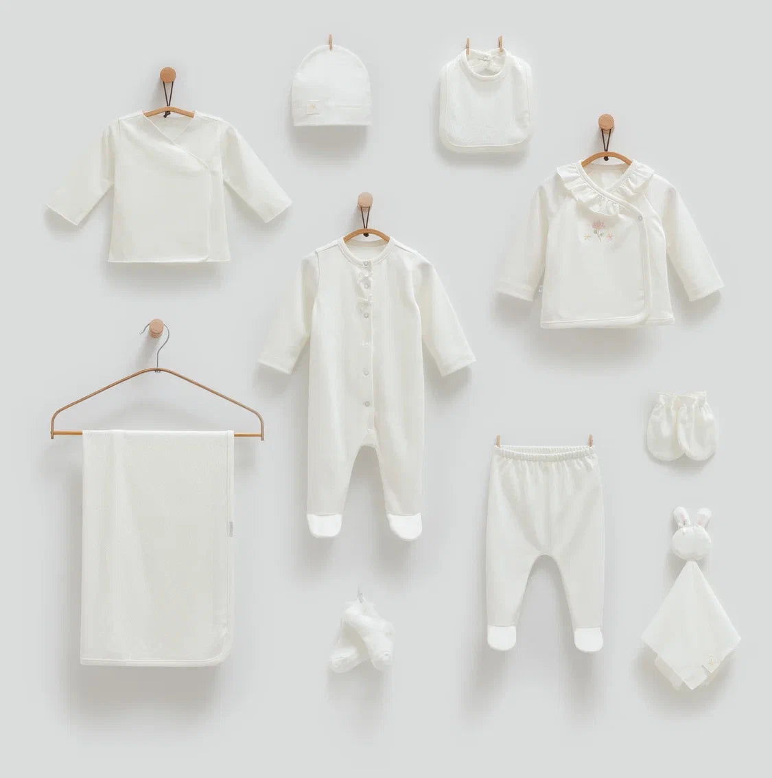 Baby 100% cotton hospital set including an overall, shirt, pants, bib, hat, mittens, socks and a blanket in Beirut, Lebanon.