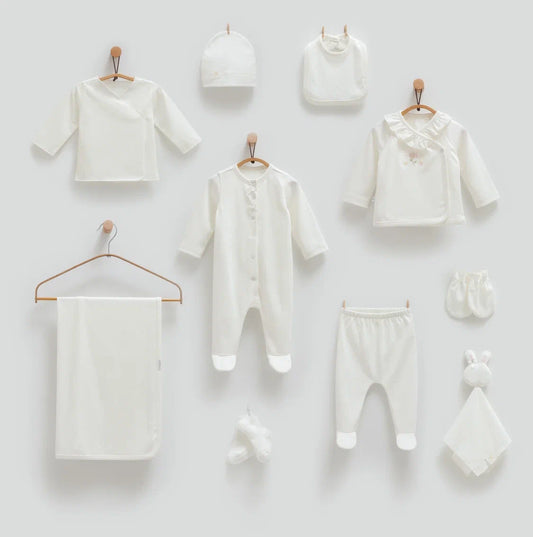 Baby 100% cotton hospital set including an overall, shirt, pants, bib, hat, mittens, socks and a blanket in Beirut, Lebanon.
