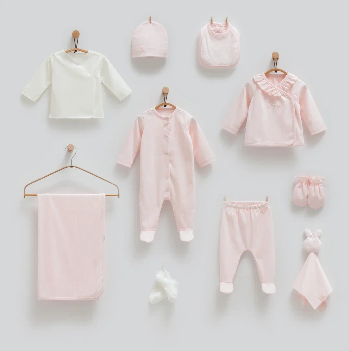 Baby 100% cotton hospital set including an overall, shirt, pants, bib, hat, mittens, socks and a blanket in Beirut, Lebanon.