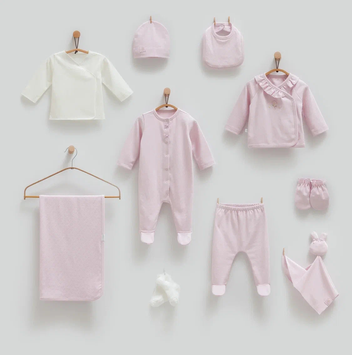 Baby 100% cotton hospital set including an overall, shirt, pants, bib, hat, mittens, socks and a blanket in Beirut, Lebanon.