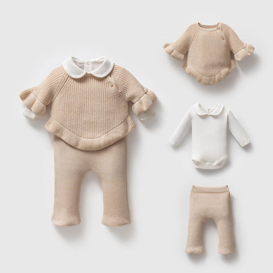Baby clothing knitted set including a romper, pants, and a top 