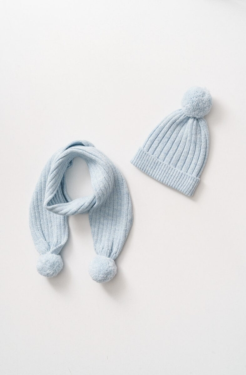 Knitted blue baby hat with matching scarf