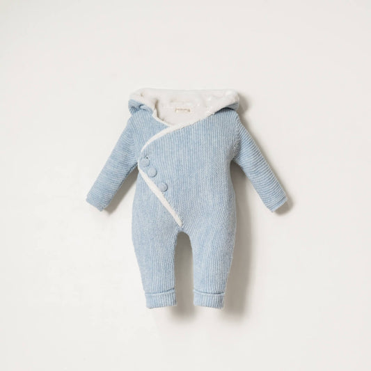 Light blue knitted baby romper with white trim on a light gray background