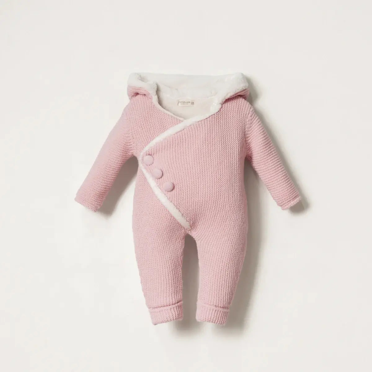 Pink baby romper with fur lining on a light pink background